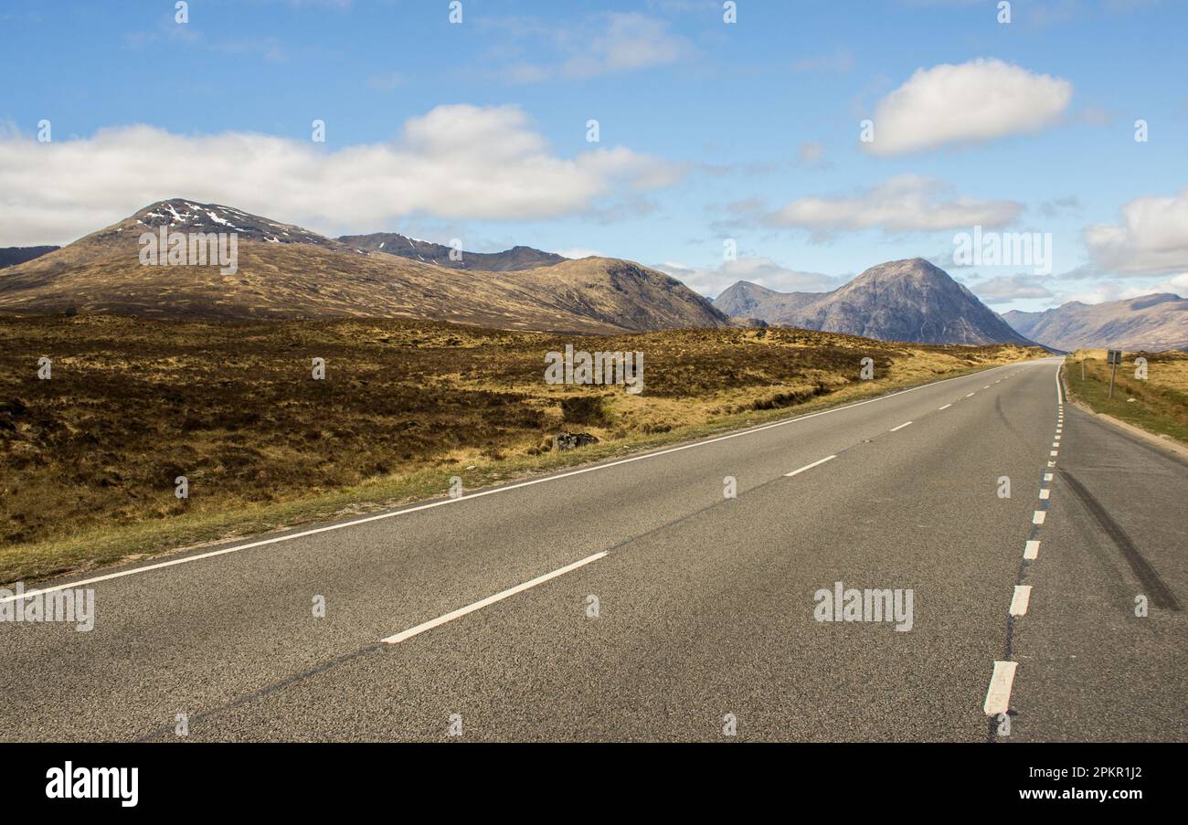 Early spring drive through the Scottish Highlands, with Buchaille Etive Mor rising in the Background Stock Photo