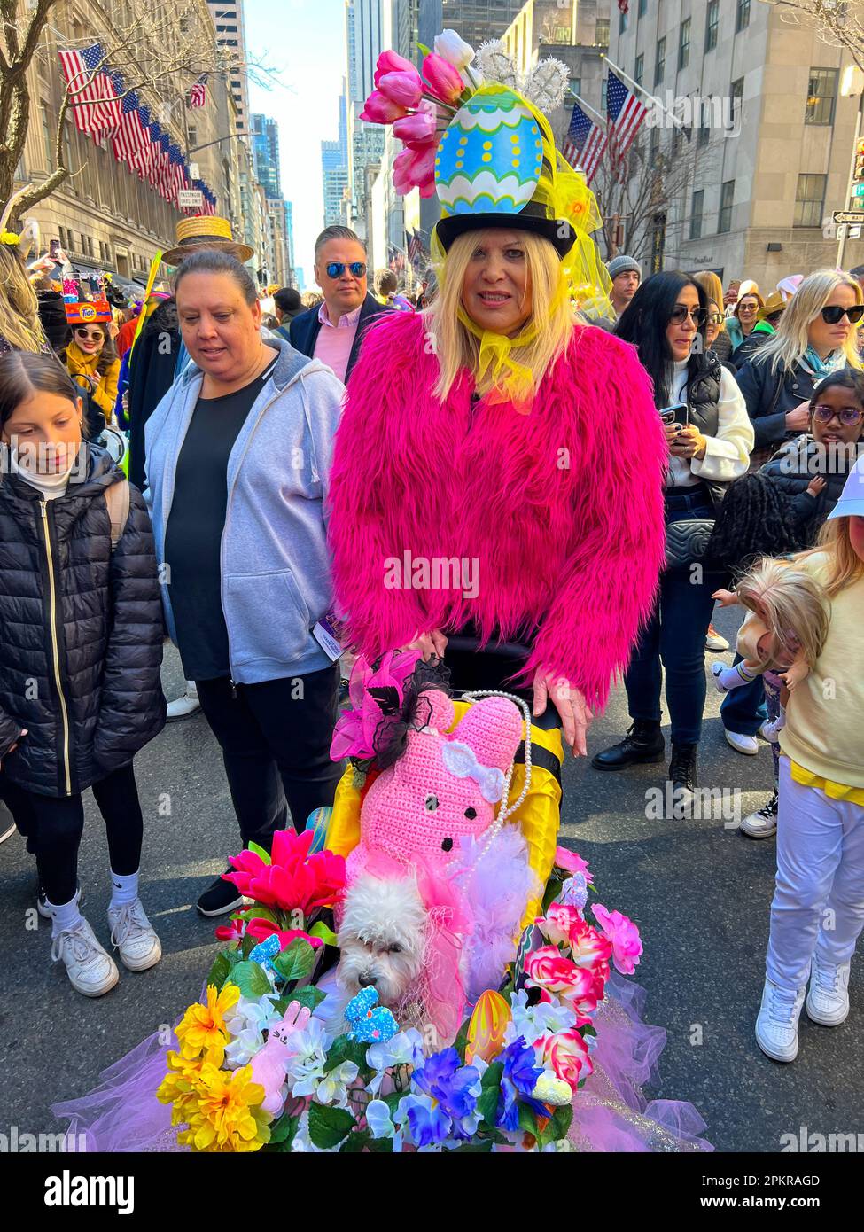 New York City, United States. 9th April, 2023. A participant with their dog in the annual Easter Parade and Bonnet Festival along Fifth Avenue on Easter Sunday on April 9, 2023 in