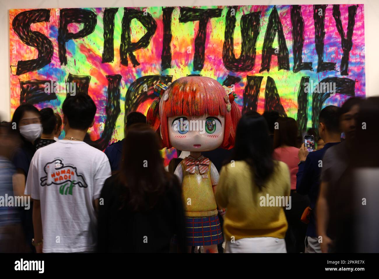 People Look At The Artworks From Tokyo S Kaikai Kiki Gallery At The Art