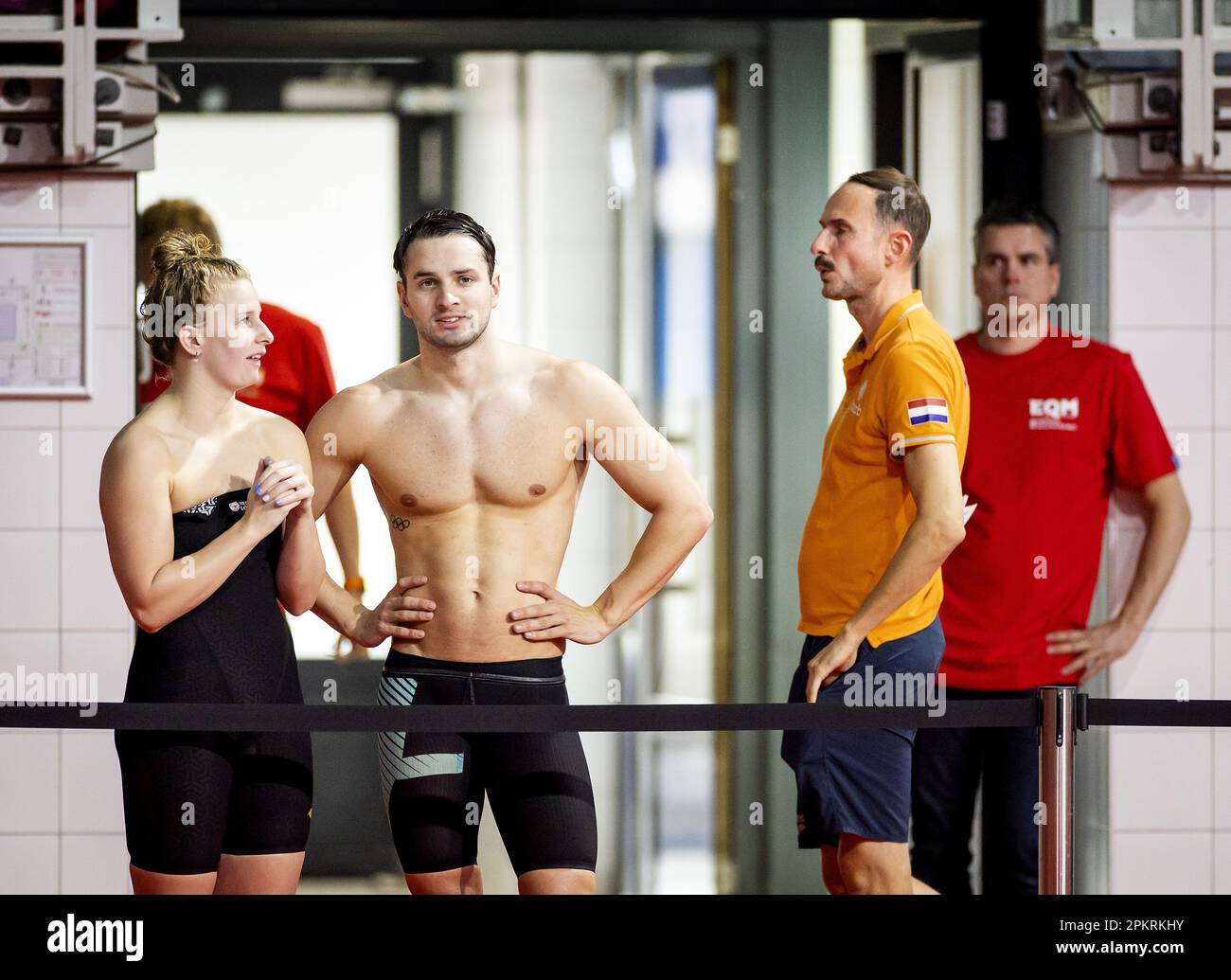 EINDHOVEN - Tes Schouten, Arno Kamminga and coach Patrick Pearson during  the final day of the Eindhoven Qualification Meet. Dutch top swimmers can  swim limits here for the upcoming World Cups and