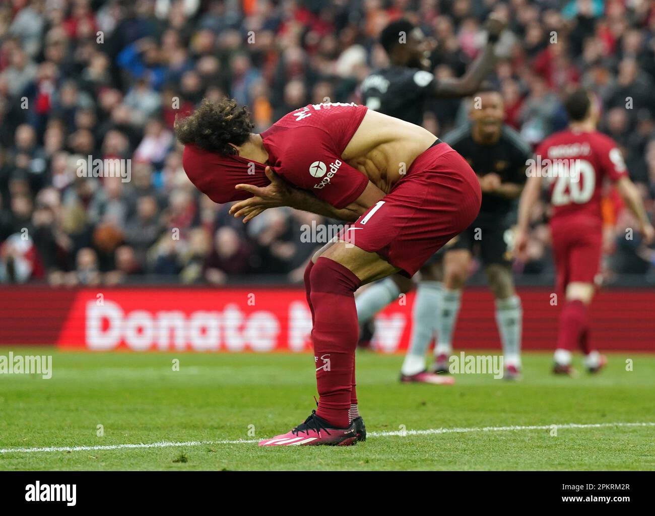 Liverpool's Mohamed Salah reacts after missing with his penalty during the Premier League match at Anfield, Liverpool. Picture date: Sunday April 9, 2023. Stock Photo