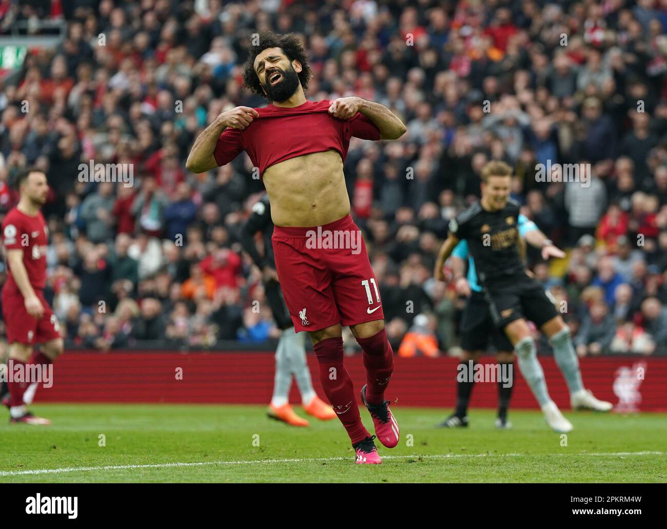 Liverpool's Mohamed Salah reacts after missing with his penalty during the Premier League match at Anfield, Liverpool. Picture date: Sunday April 9, 2023. Stock Photo