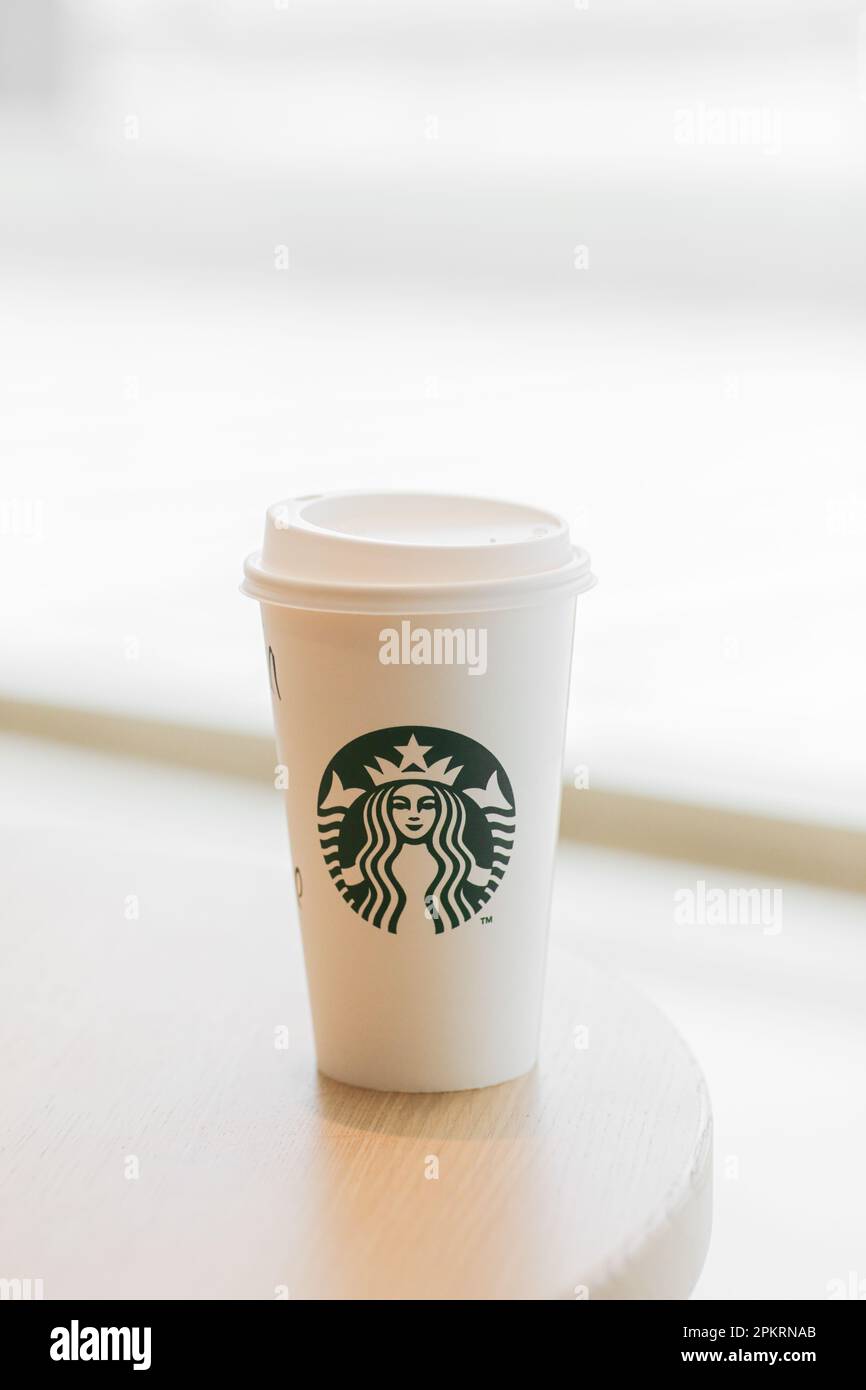 Valencia, Spain: March 18, 2023: White paper cup of hot beverage or ...