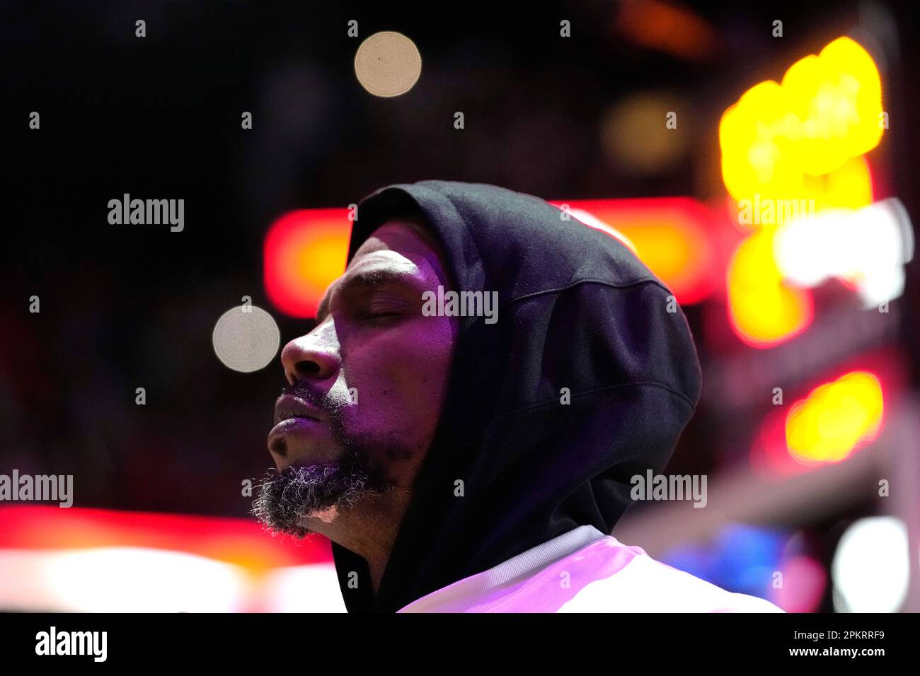 Miami Heat forward Udonis Haslem stands for the national anthem before ...