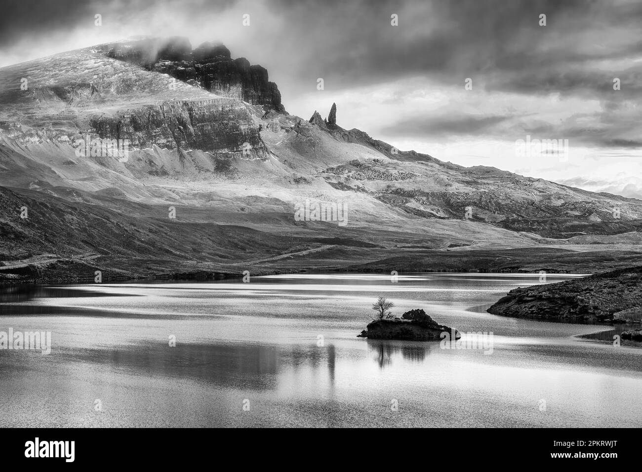Old Man of Storr over Loch Leathan on the Isle of Skye in Scotland Stock Photo