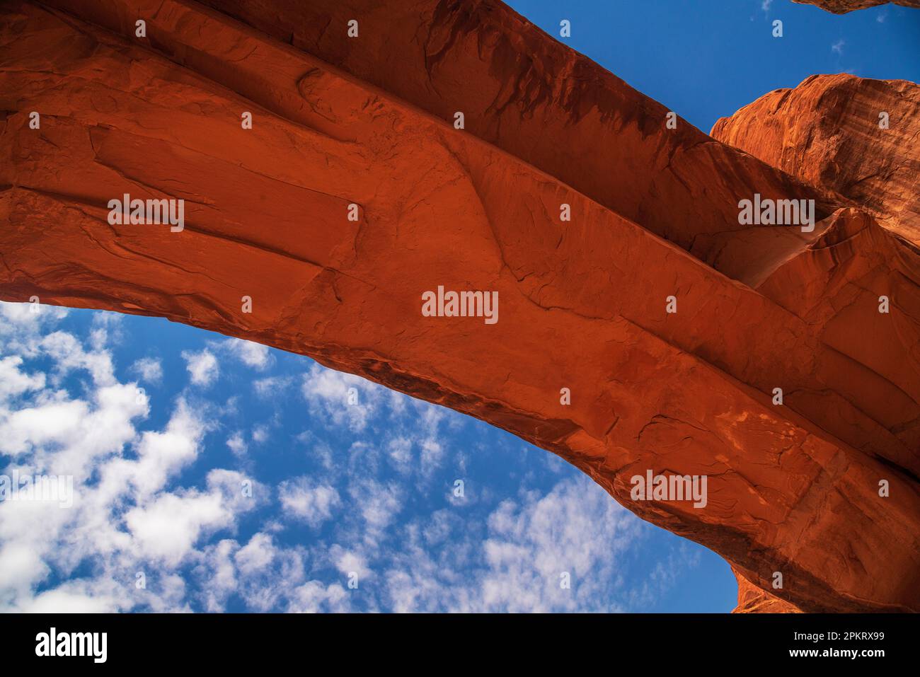 Entrada sandstone of Tower Arch with blue sky in Arches National Park in Moab Utah Stock Photo