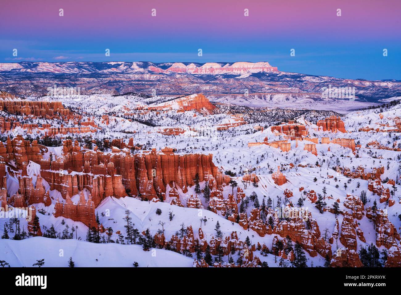 Twilight color over the hoodoos of Bryce Canyon National Park in Utah Stock Photo