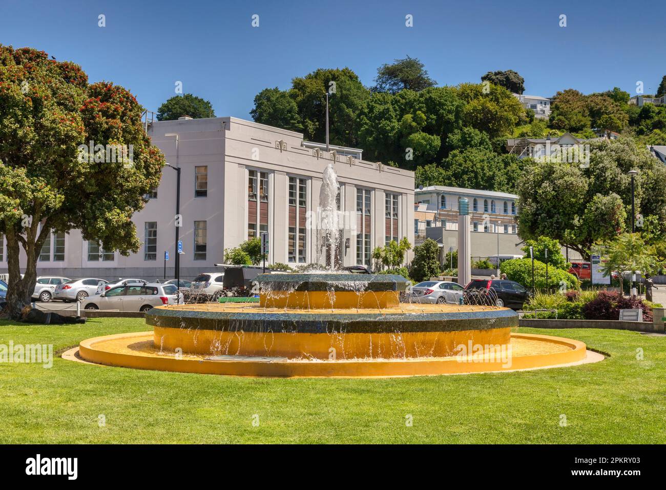 5 December 2022: Napier, Hawkes Bay, New Zealand - Art deco style buildings and the Tait Fountain fountain in the centre of Napier, and a view to some Stock Photo