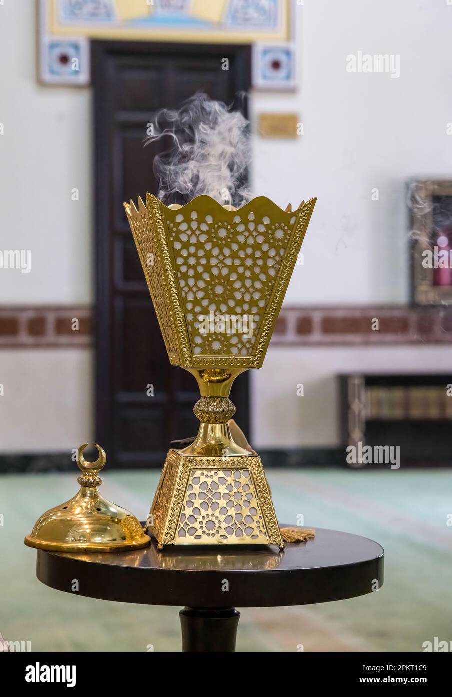 Golden incense burner inside the Jumeirah Mosque in Dubai open to all