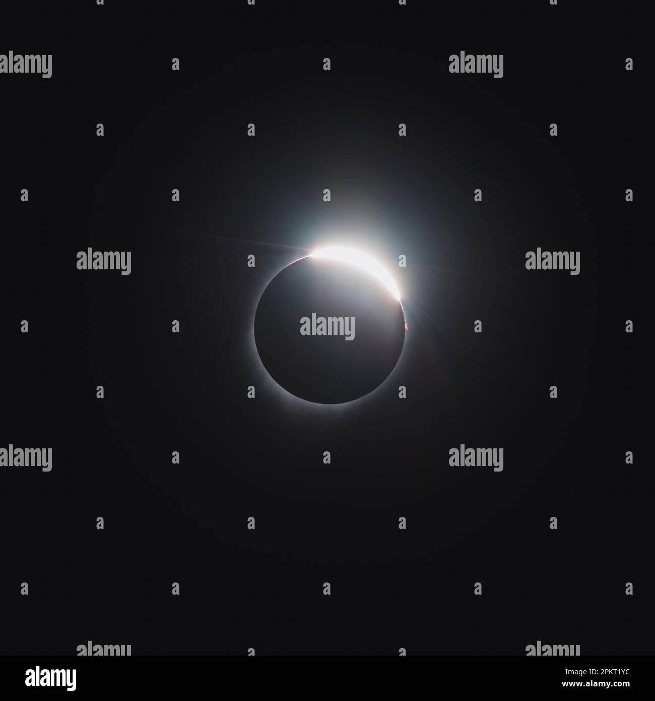 First ray of sun at the end of a total solar eclipse Stock Photo - Alamy