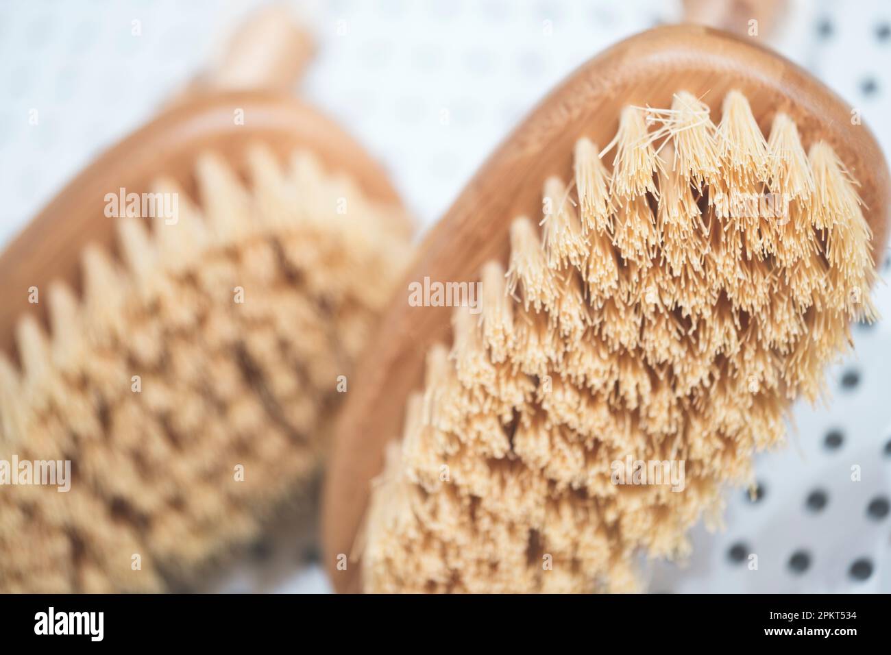kitchen brushes hang in supermarket Stock Photo