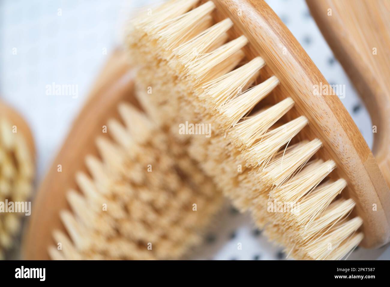 kitchen brushes hang in supermarket Stock Photo