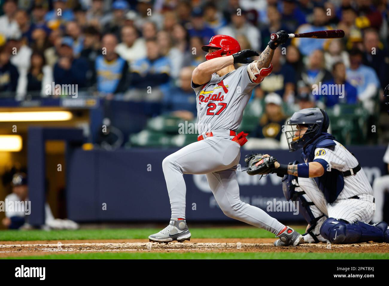 April 8, 2023: St. Louis Cardinals center fielder Tyler O'Neill (27) hits a  ball in play during the game between the Milwaukee Brewers and the St.  Louis Cardinals at American Family Field