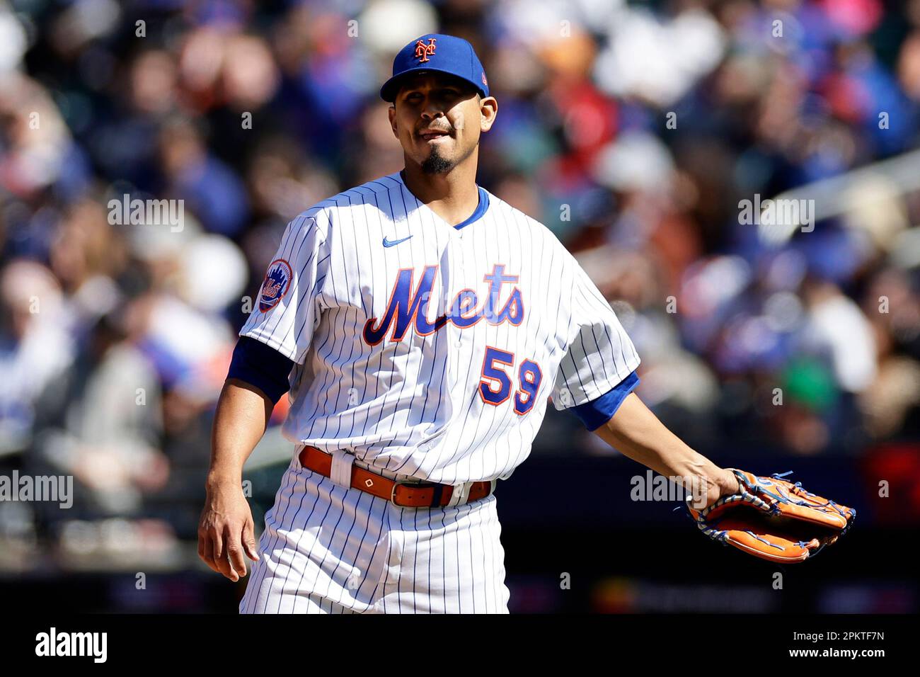 New York Mets pitcher Carlos Carrasco reacts during the third inning of