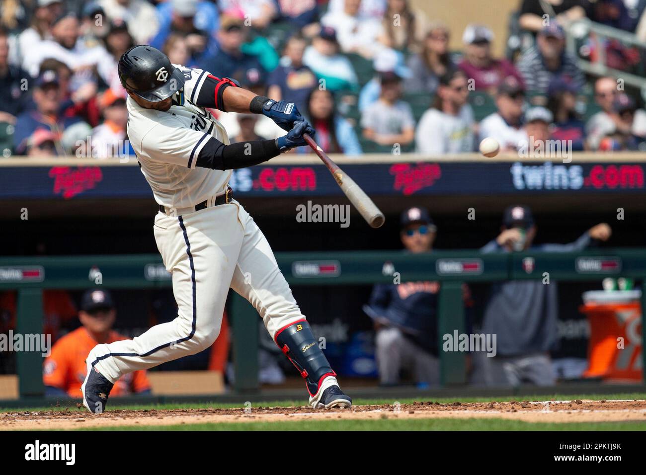 MINNEAPOLIS, MN - APRIL 09: Minnesota Twins first baseman Donovan Solano  (39) hits an RBI double during the MLB game between the Houston Astros and  the Minnesota Twins on April 9th, 2023,