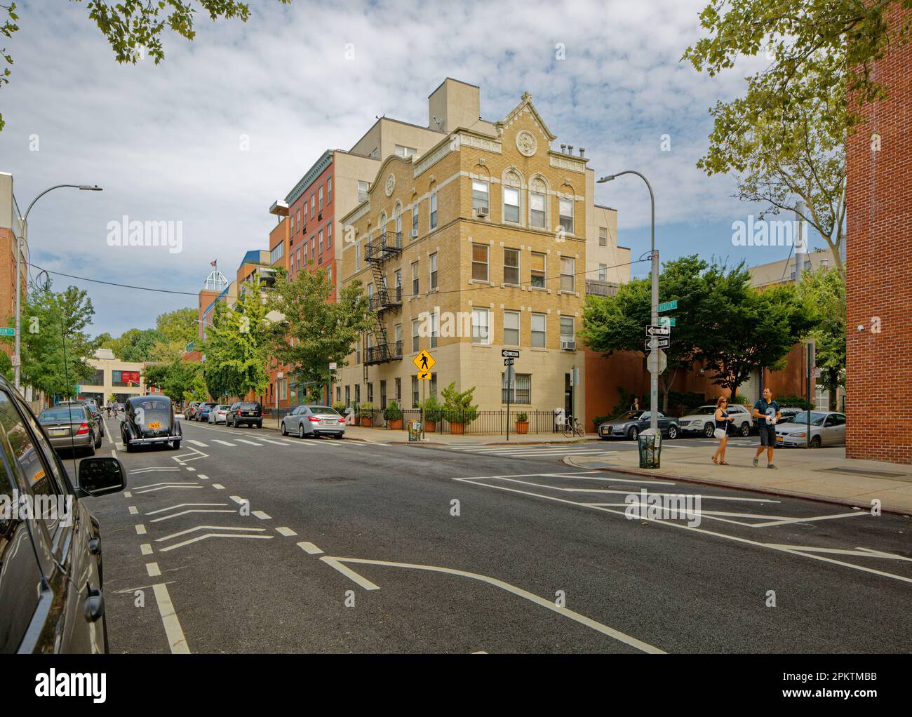 134 Boerum Place, in Boerum Hill, Brooklyn, is a low-rise brick apartment building at the corner of Boerum Place and Bergen Street. Stock Photo