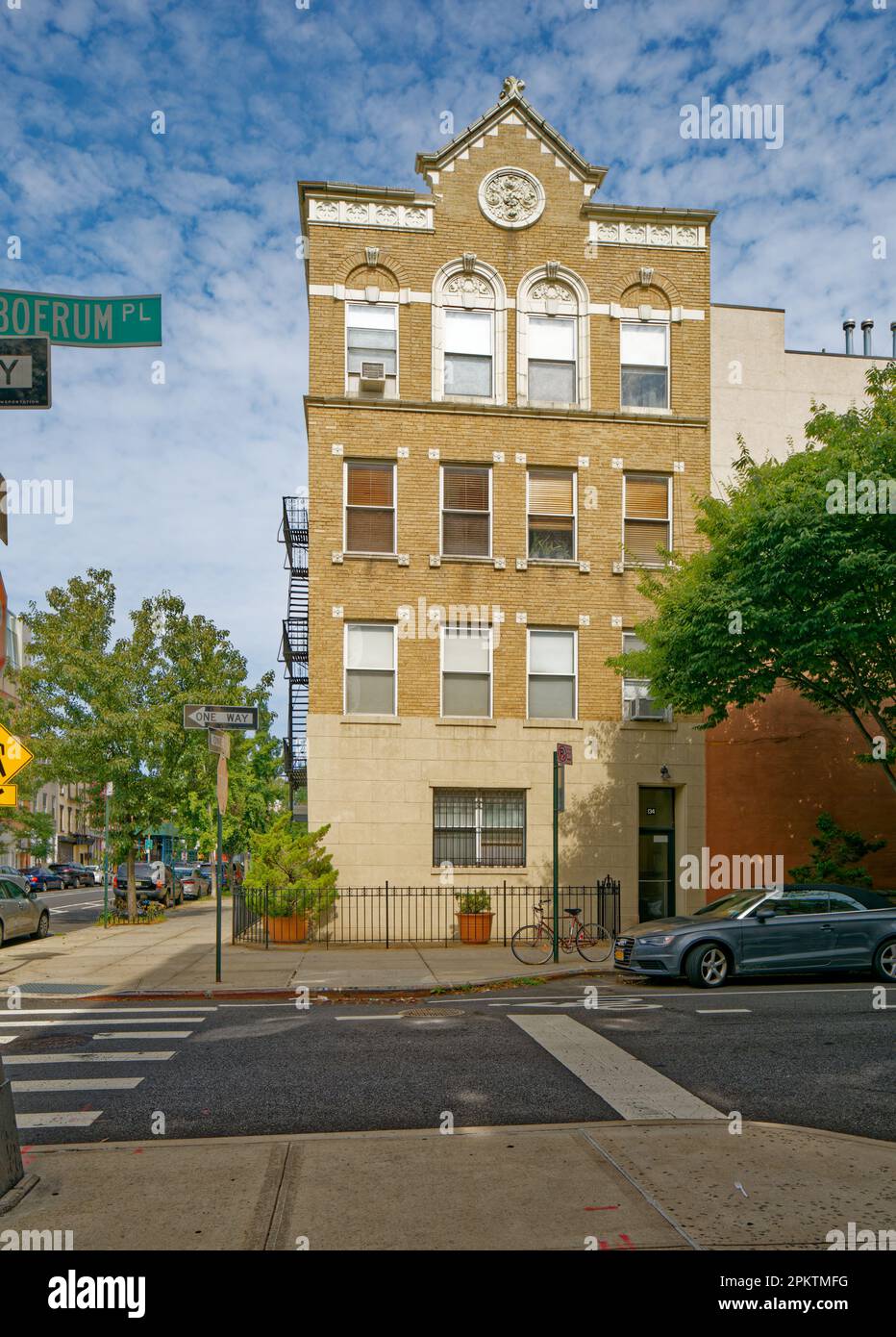 134 Boerum Place, in Boerum Hill, Brooklyn, is a low-rise brick apartment building at the corner of Boerum Place and Bergen Street. Stock Photo