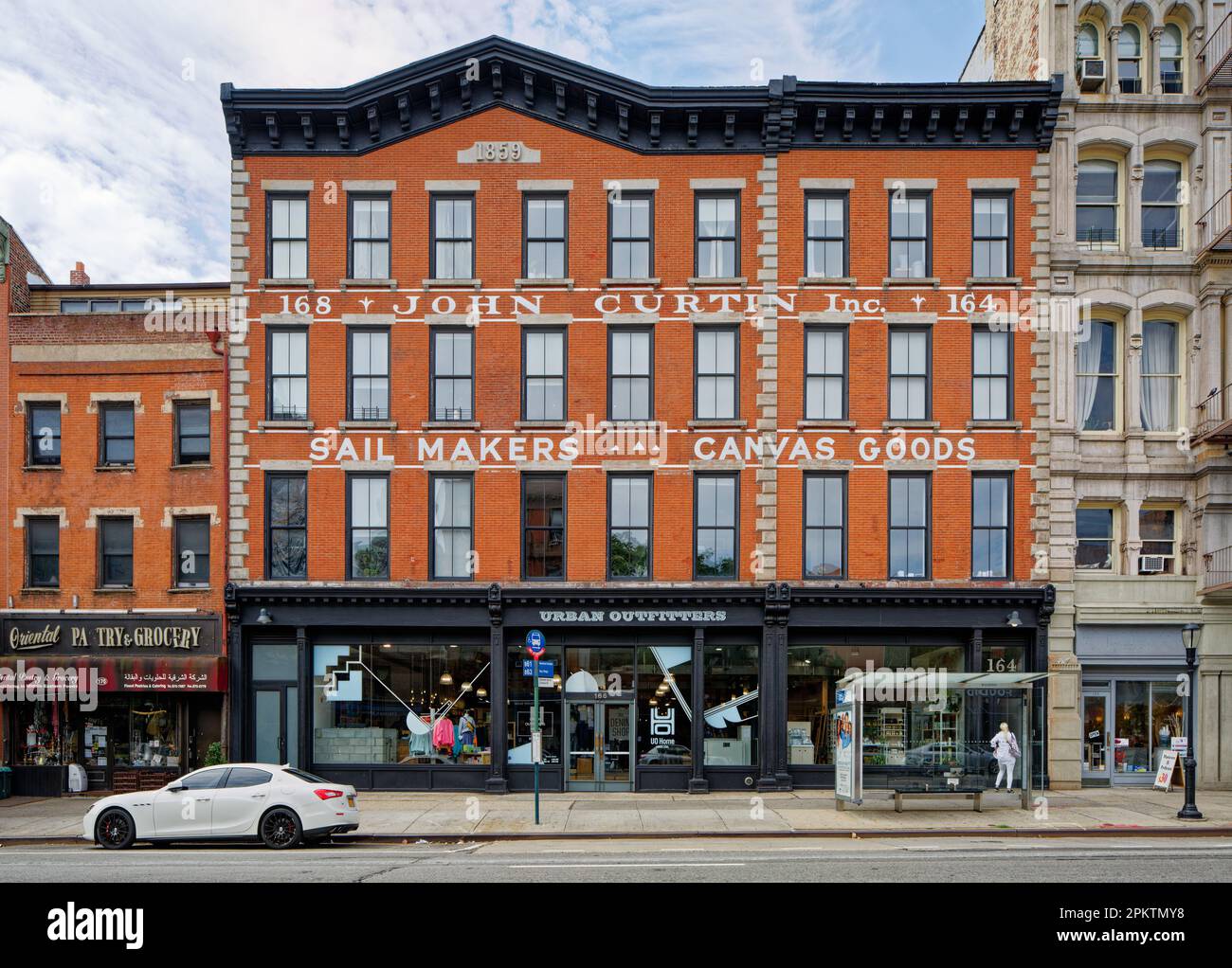 164 Atlantic Avenue is a brick commercial building, converted to apartments above street-level retail in Brooklyn’s Cobble Hill Historic District. Stock Photo