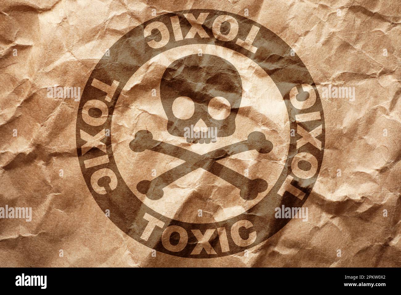 Hazard warning sign (skullandcrossbones symbol and word TOXIC) on