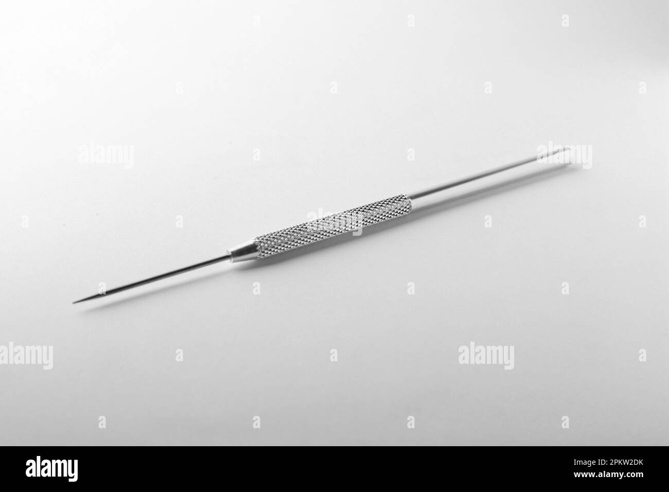 Stainless steel needle for clay modeling on white background Stock