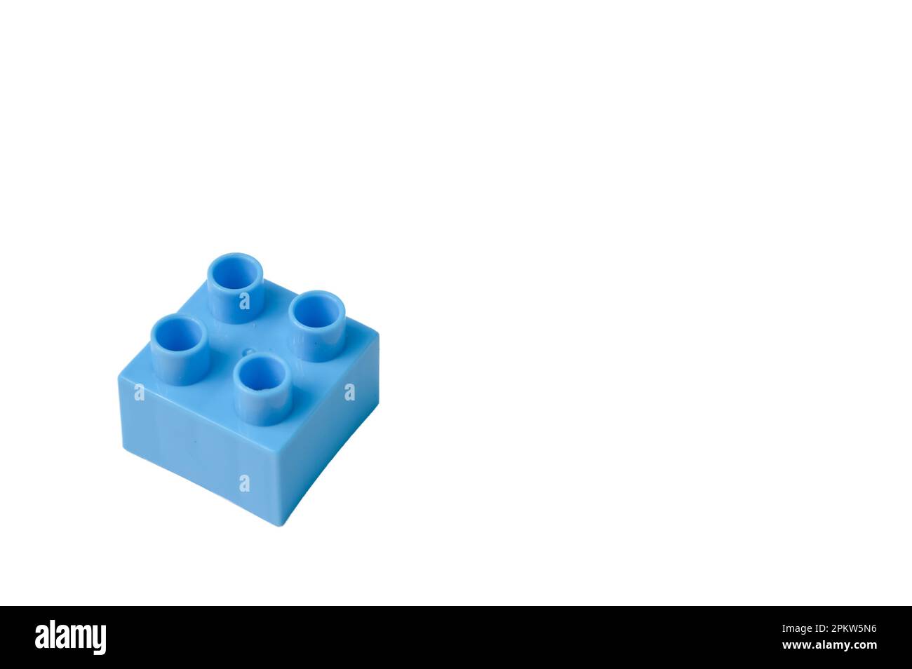 Blue toy building block isolated on a white background Stock Photo - Alamy