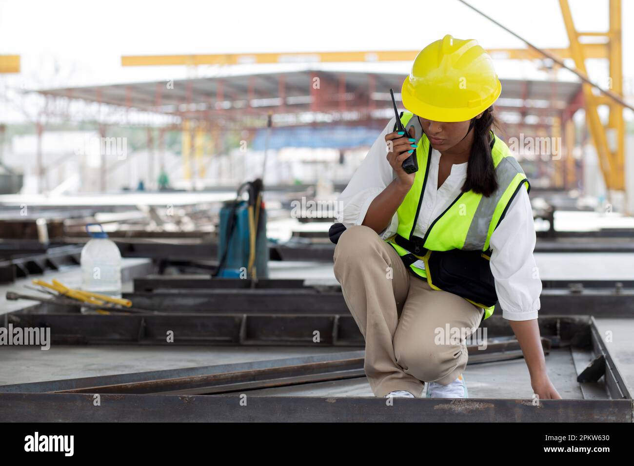 Construction worker examining concrete hi-res stock photography and ...