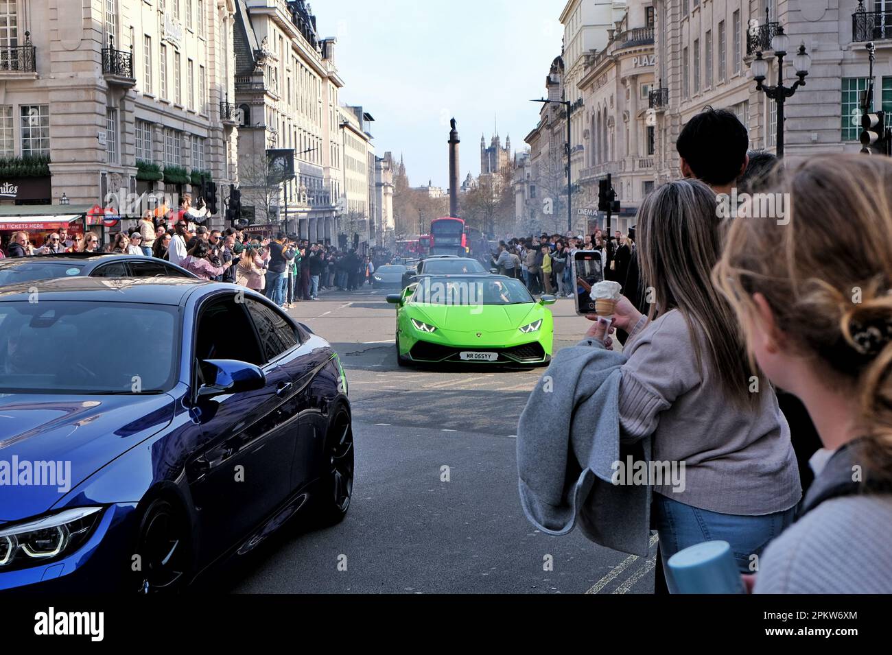 London, UK. 9th April, 2023. Visitors to the West End enjoyed the warmer temperatures before the rain is set to return on Monday as a supercar meet and an Easter-themed skating event passed through Piccadilly Circus attracting crowds of people. Credit: Eleventh Hour Photography/Alamy Live News Stock Photo