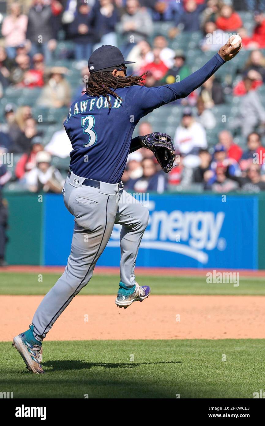 CLEVELAND, OH - APRIL 09: Seattle Mariners shortstop J.P. Crawford (3)  throws to first base for an out during the tenth inning of the Major League  Baseball game between the Seattle Mariners