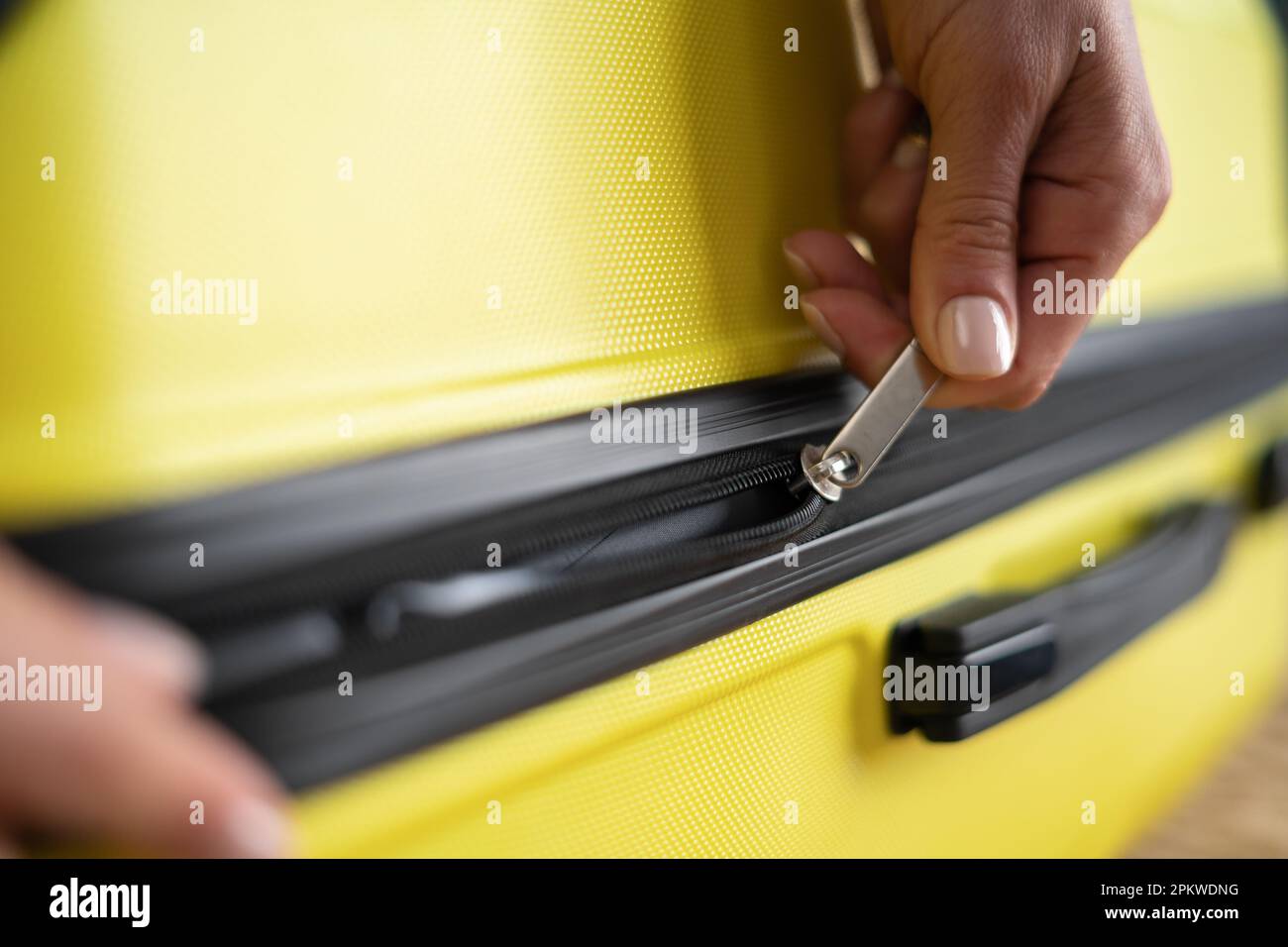 Black woman packing suitcase hi-res stock photography and images - Alamy