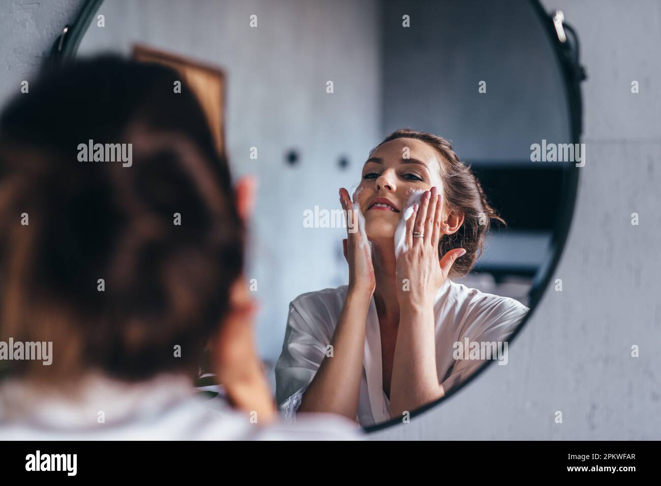 Woman takes care face hi res stock photography and images Alamy
