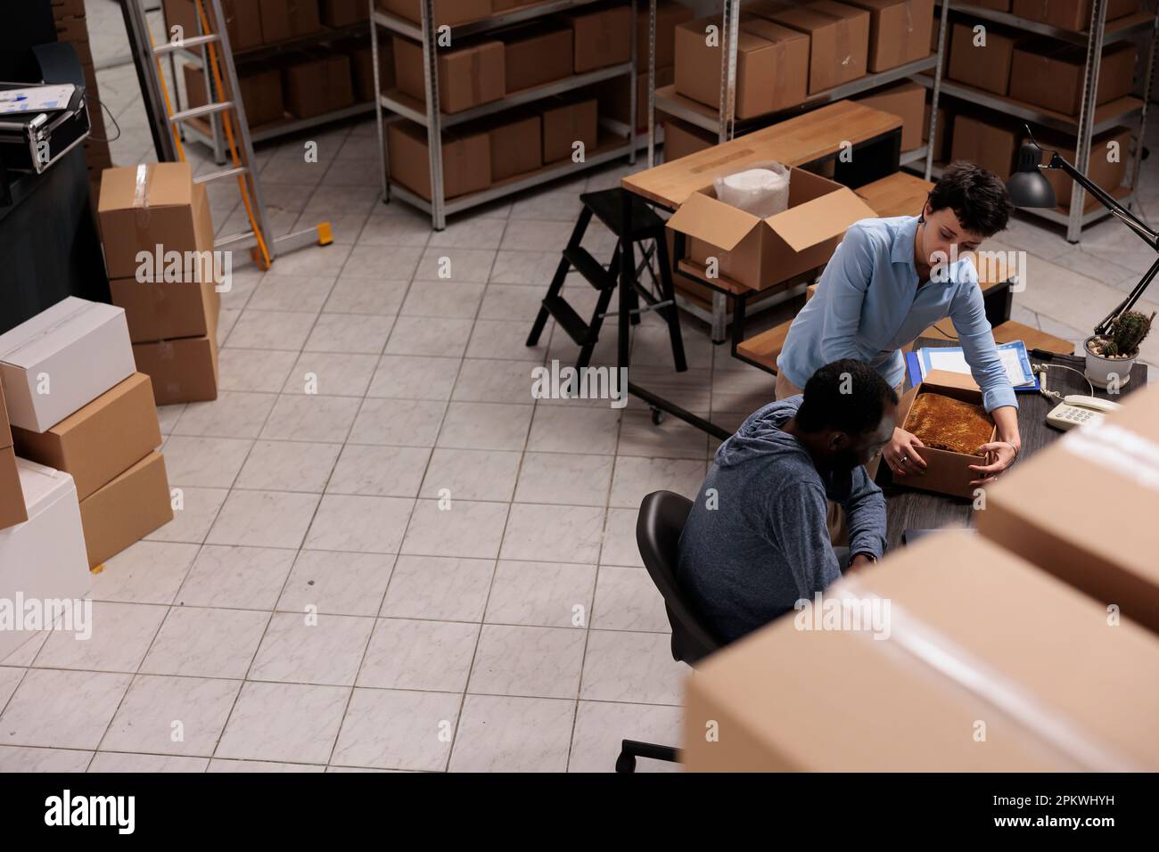 African business people moving boxes hi-res stock photography and ...