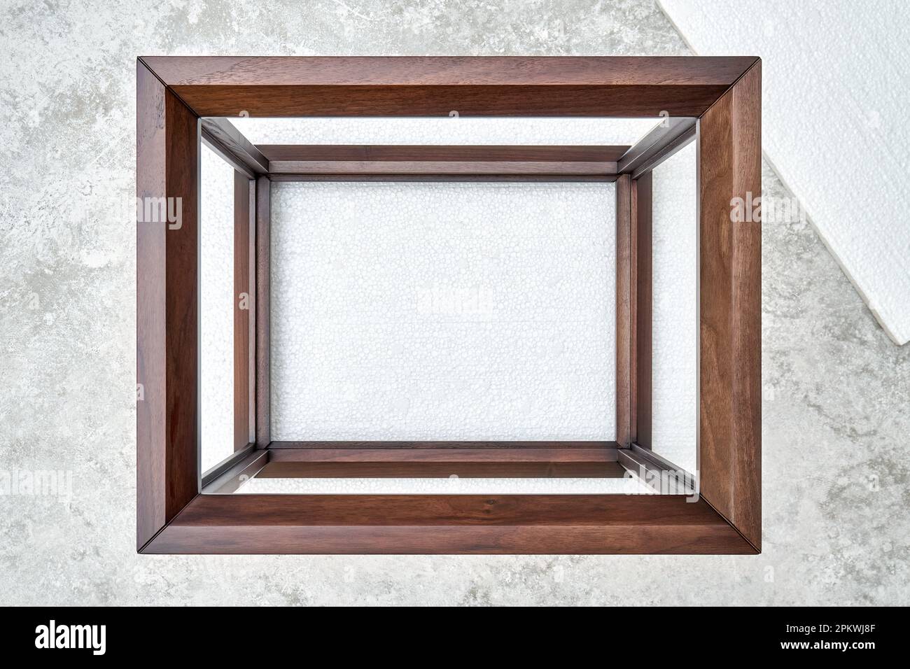 Wooden frame of bedside table made of solid walnut in Joinery