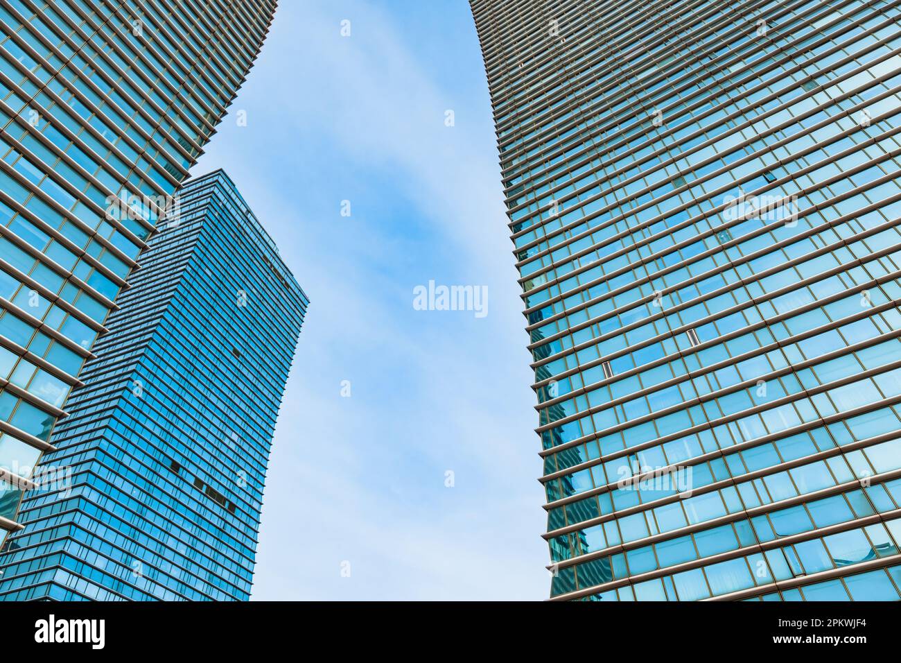 Glass office building exterior against the sky Stock Photo - Alamy