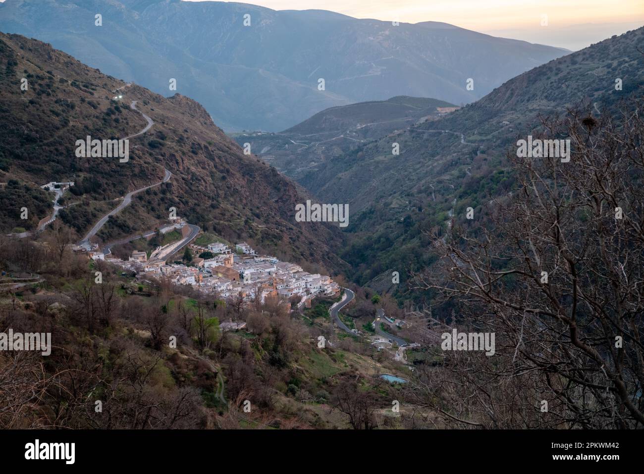 Views of the village of Pampaneira in the hills of southern Spain, nestling close to the Sierra Nevada. Pic taken from neighbouring village of Bubión. Stock Photo