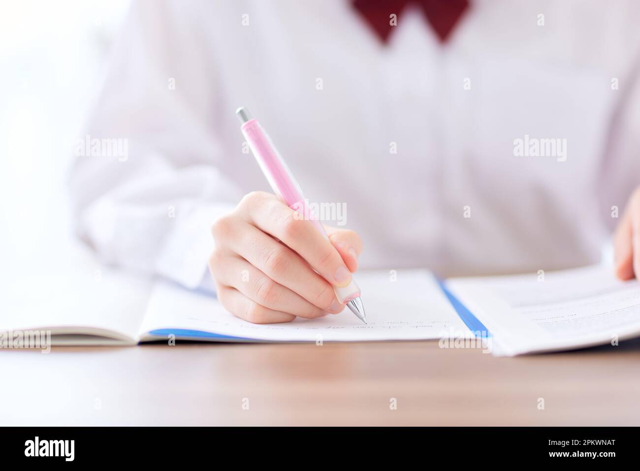 Japanese high school student in uniform studying Stock Photo
