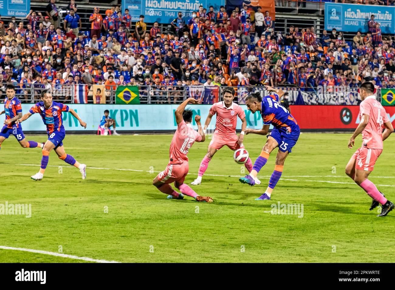 Football action during Thai league match at PAT stadium, Klong Toey