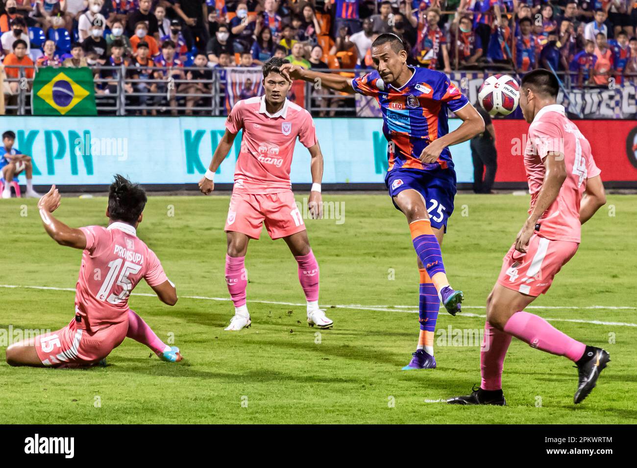 Football action during Thai league match at PAT stadium, Klong Toey