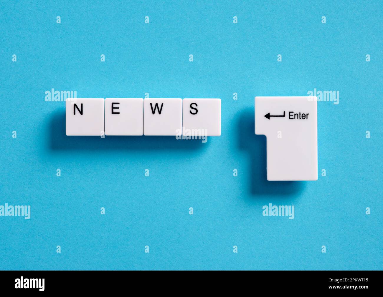 Online internet news. Broadcasting, publishing or watching the latest news concept. Computer keyboard keys with the word news. Stock Photo