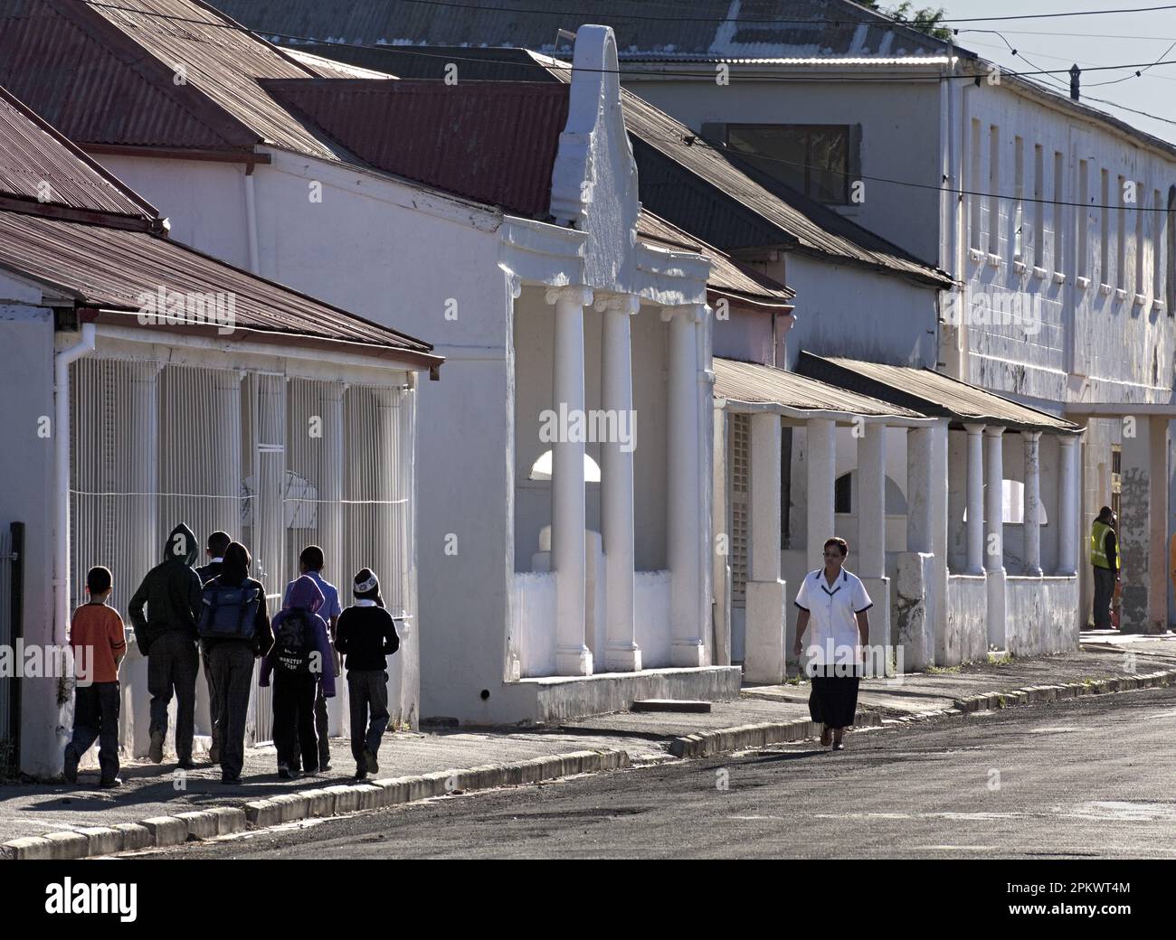 A group of children walk down a street in the Karoo town of Richmond. Richmond lies about halfway along the N1 National road between Cape Town and  Jo Stock Photo