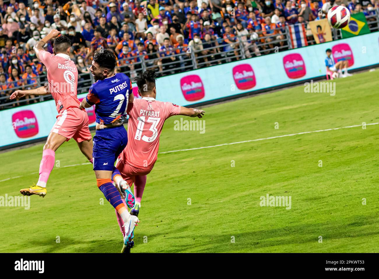 Football action during Thai league match at PAT stadium, Klong Toey