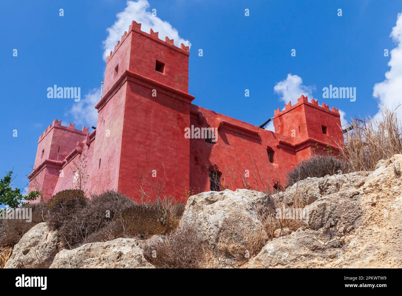 Saint Agathas Tower exterior on a sunny day. Red Tower or Fort Saint Agatha. It is a large watchtower in Mellieha, Malta. It was built between 1647 an Stock Photo