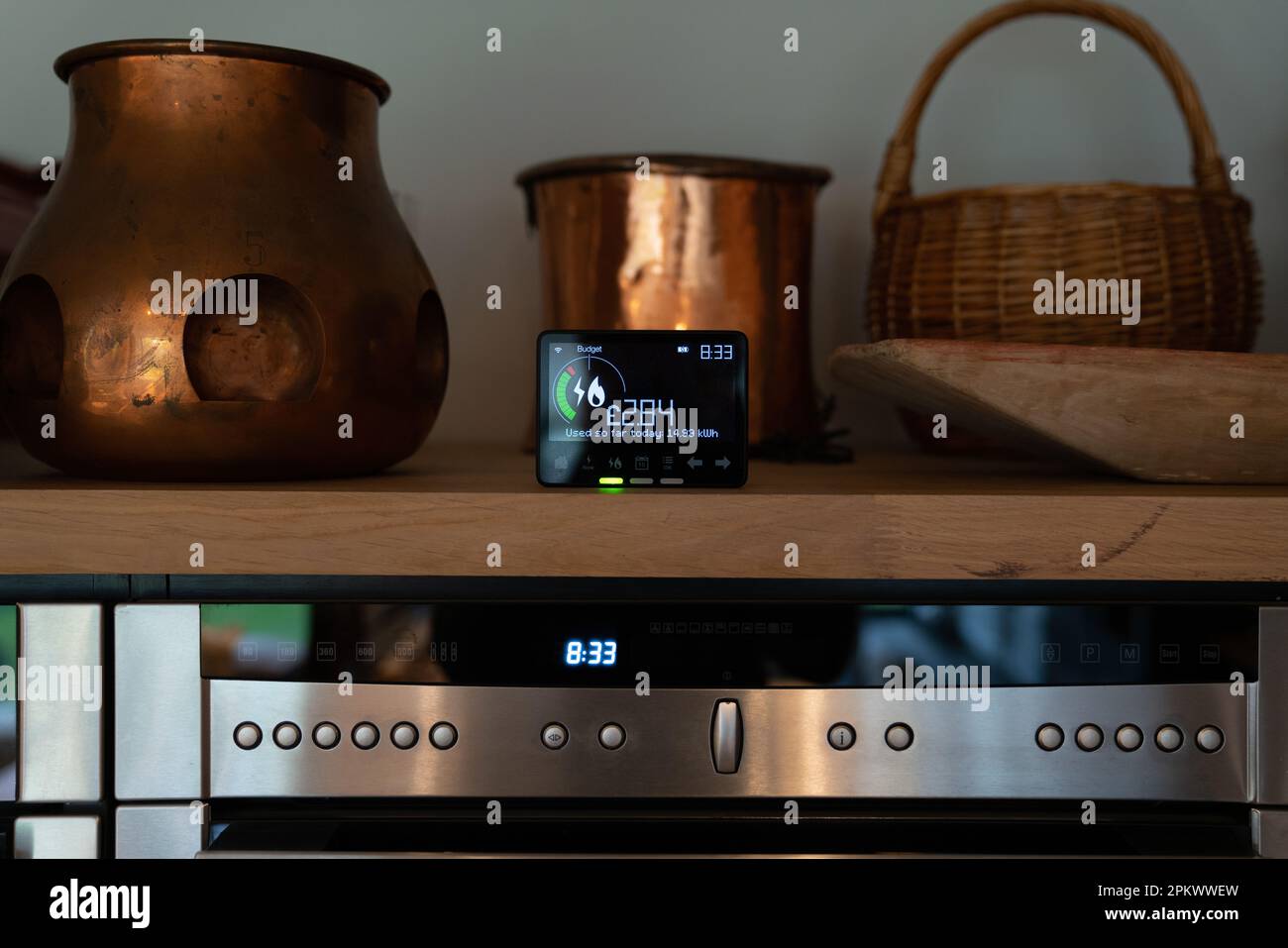Gas and electricity energy use smart meter in kitchen of a home in England, UK. Stock Photo
