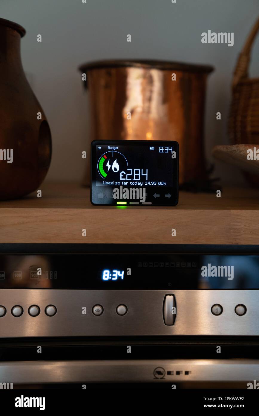 Gas and electricity energy use smart meter in kitchen of a home in England, UK. Stock Photo