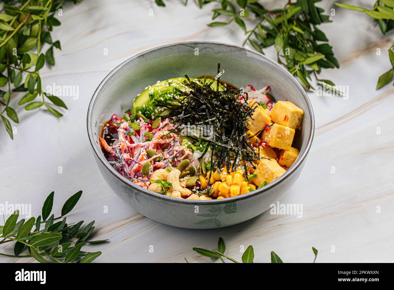 Portion of poke bowl with tofu and vegetables Stock Photo - Alamy