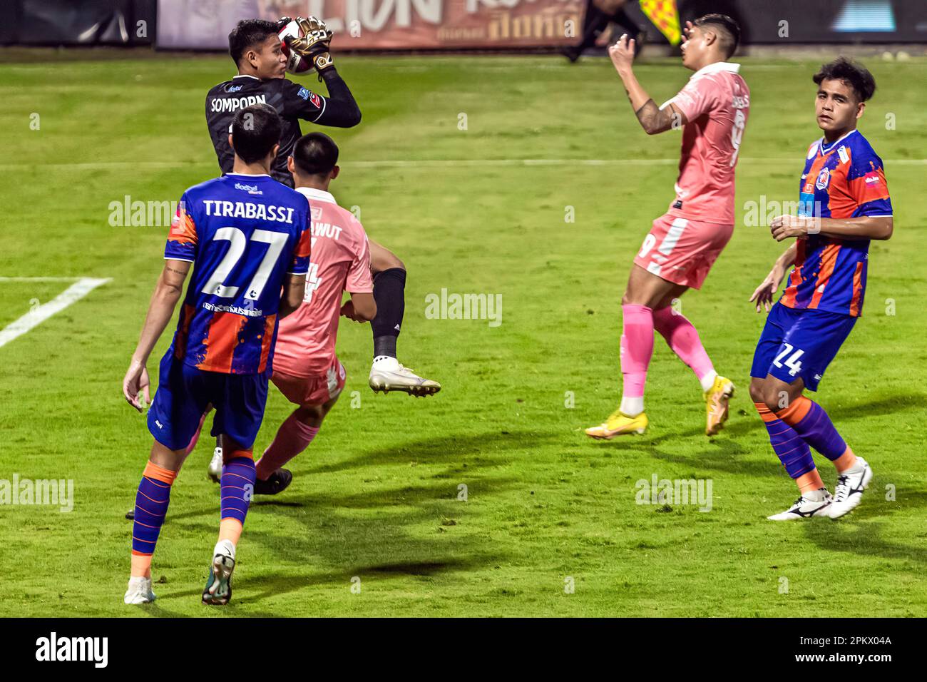 Football action during Thai league match at PAT stadium, Klong Toey
