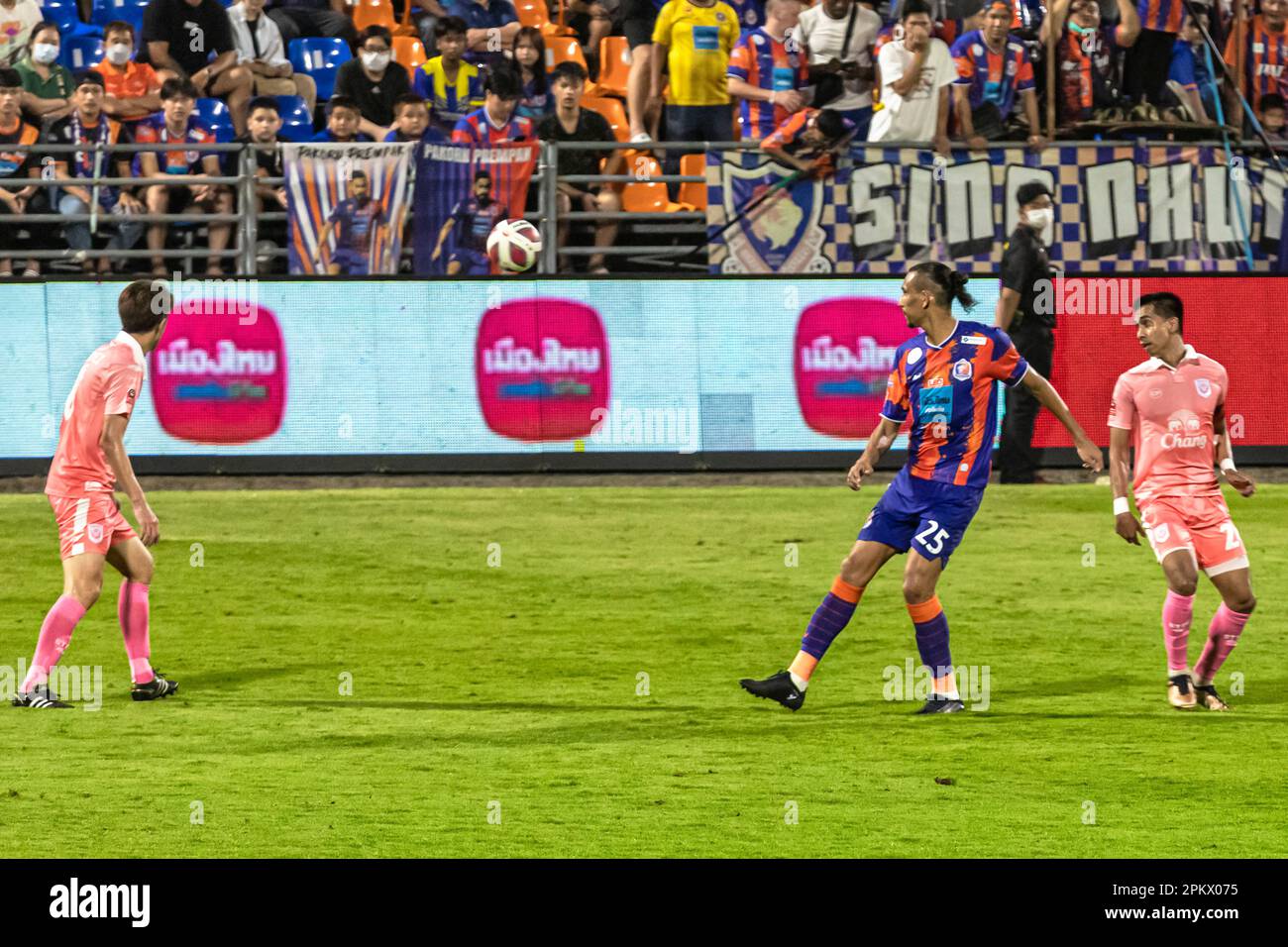 Football action during Thai league match at PAT stadium, Klong Toey