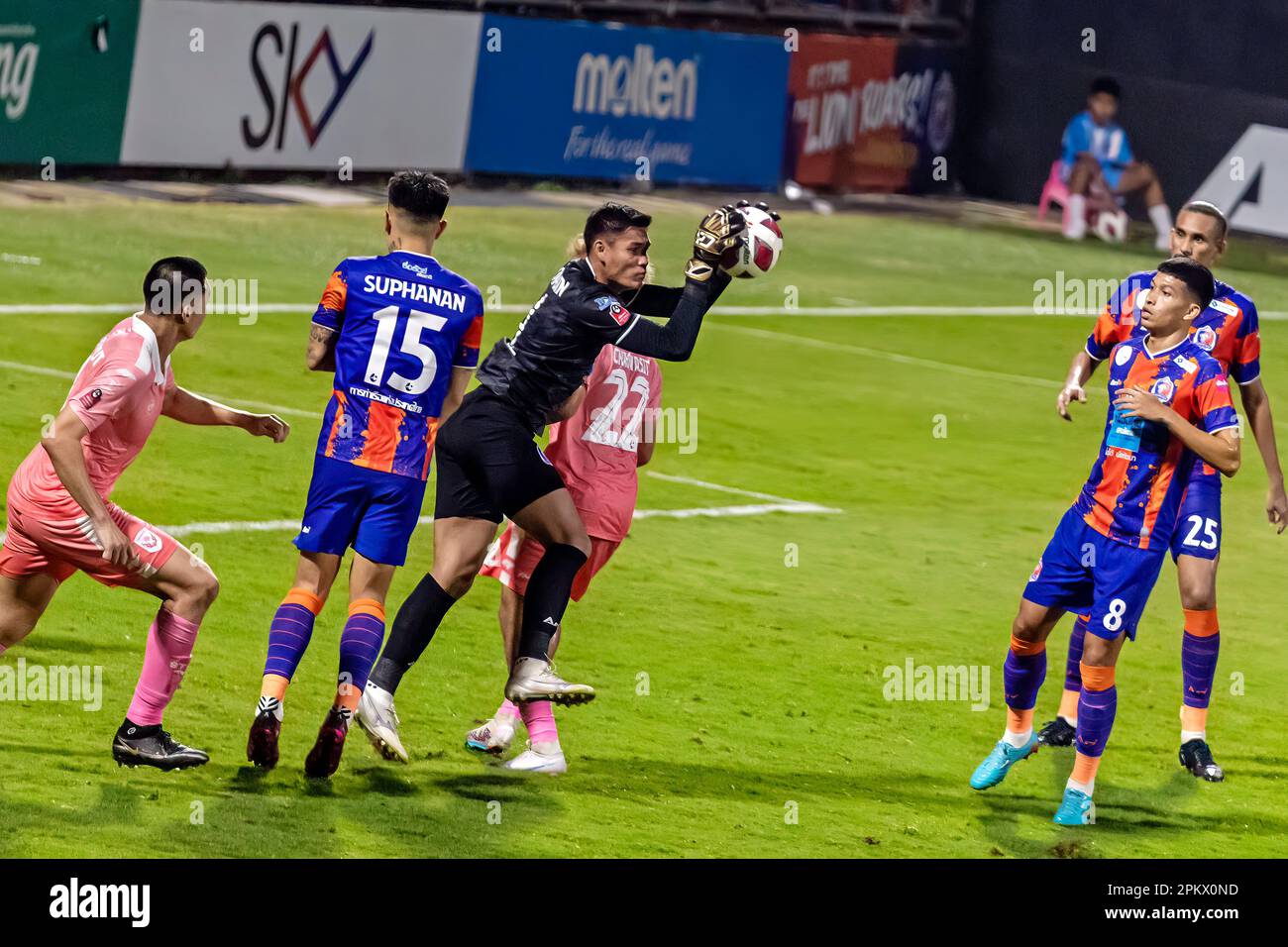 Football action during Thai league match at PAT stadium, Klong Toey
