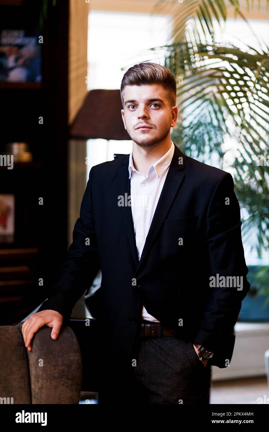 young stylish european man in a suit before a business meeting Stock Photo