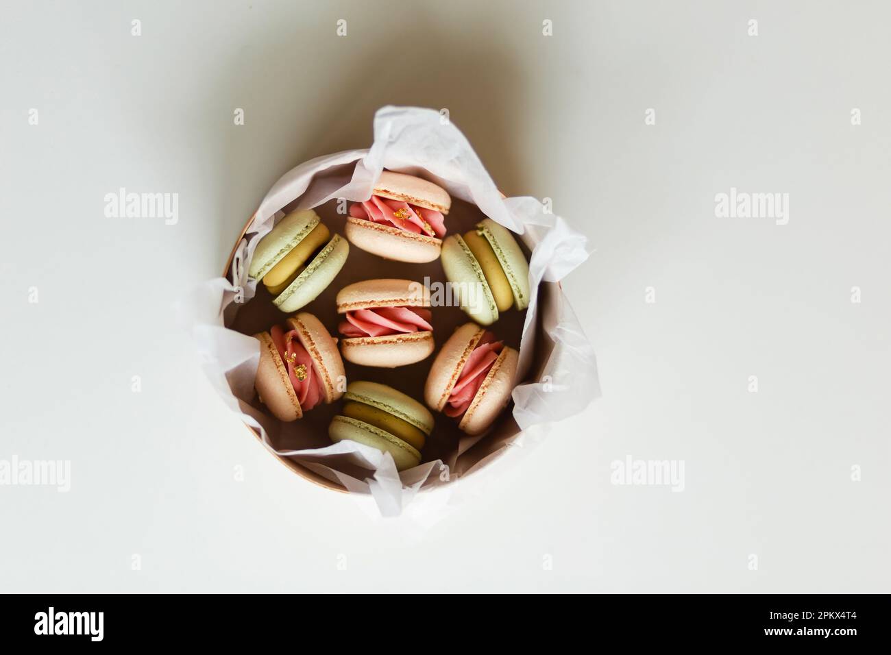 box of freshly made macaroons in the kitchen Stock Photo