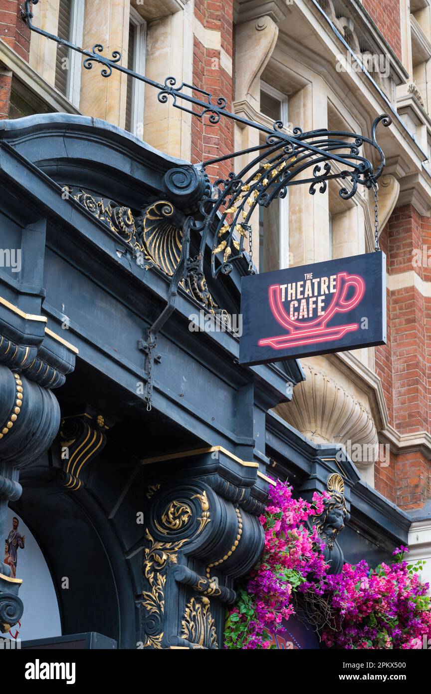 Neon sign above the elaborate entrance to the Theatre Cafe, a theatre